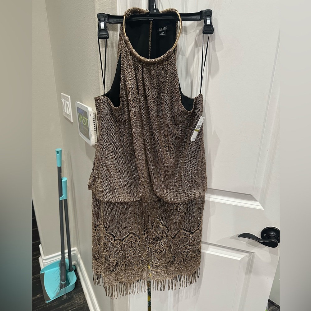 Elegant Brown Sleeveless Dress with Fringe